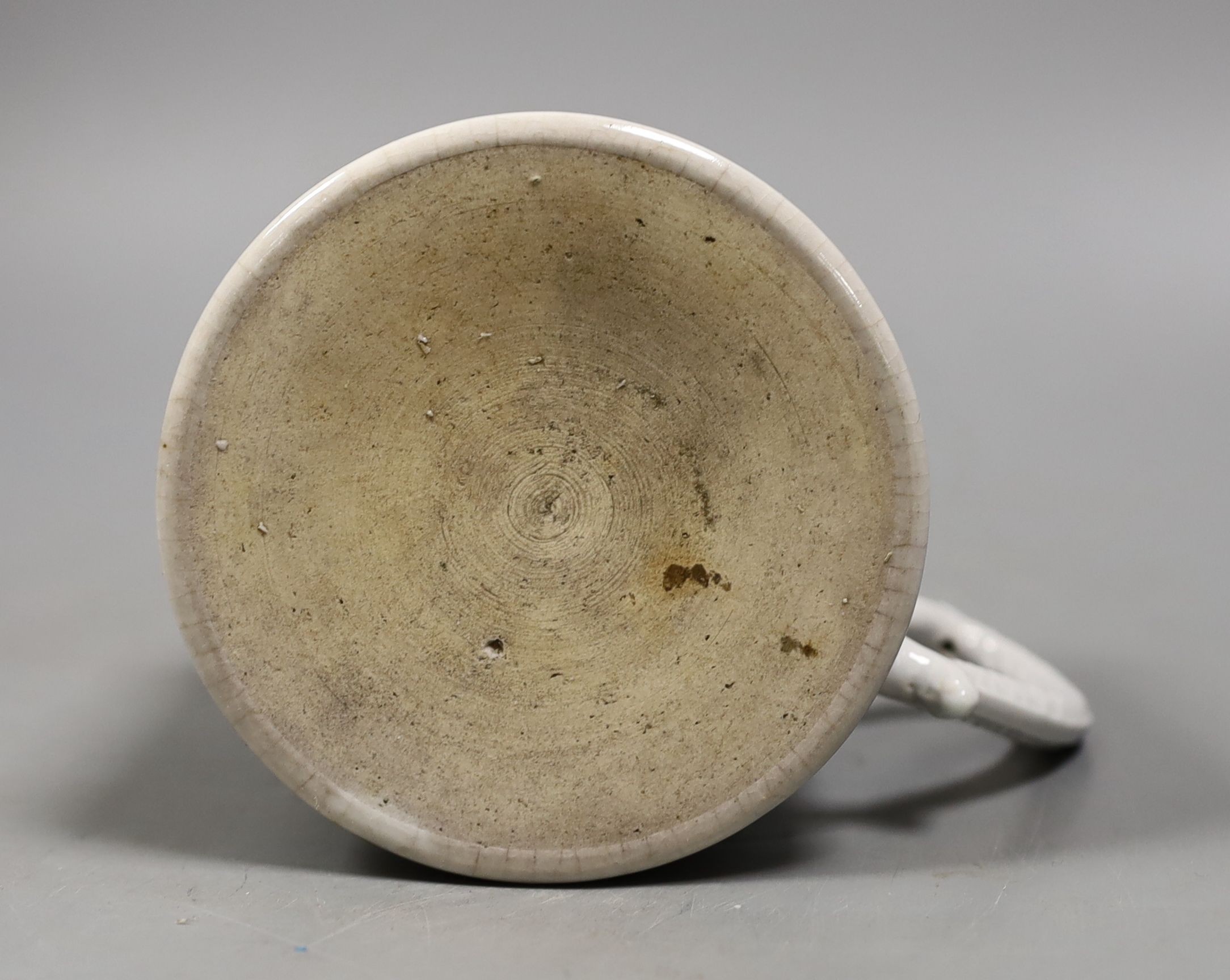 A Chinese blue and white mug, late 18th century, 11.5 cms high.